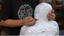 呼吸制御と口腔内虐待のMummification
